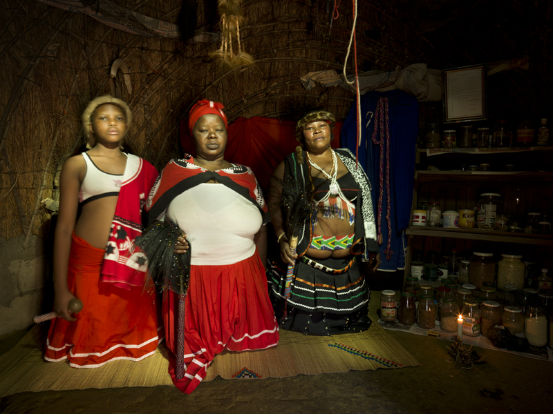 Three Sangomas in the healer's hut.