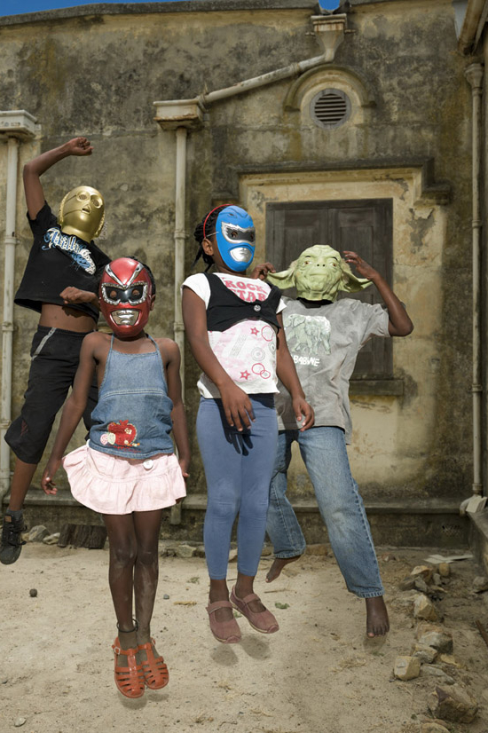 Little Superheroes boys and girls with superhero masks jumping in South Africa